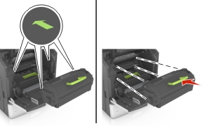 Insert the toner cartridge into the printer by aligning the side rails of the cartridge with the arrows on the side rails inside the printer.
