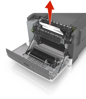 Hold down the fuser cover, and then remove the jammed paper.