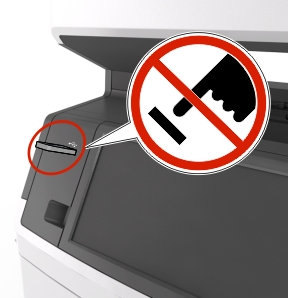 A warning not to touch the memory device that is inserted in the USB port