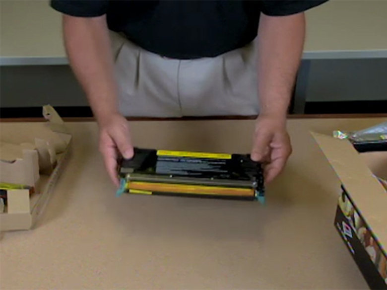 Shake the new toner cartridge to evenly distribute the toner