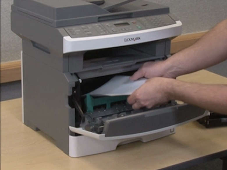 Remove jammed paper from within the printer