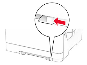 The manual feeder guides in tray 1 are adjusted.