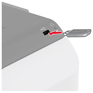 A flash drive is inserted into the front USB port.