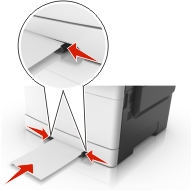 Adjust the paper guides to width of the paper loaded.