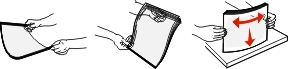 Hold transparencies by the edges, fan them, and then straighten the edges on a level surface.