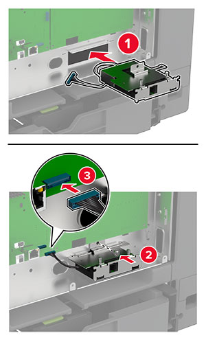 The fax card is installed and the connector is attached to the controller board.