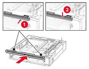 The upper tray cover is aligned, and then attached to the tray base.