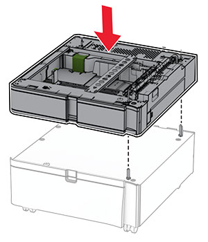 The optional 550-sheet tray is aligned and lowered into the cabinet.