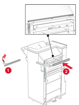 The foam tape is peeled, and then attached to the booklet finisher.