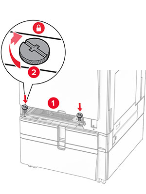 The screws are aligned to the tray base, and then turned clockwise.