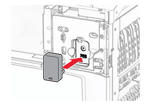 The card reader is aligned and inserted into the USB port.