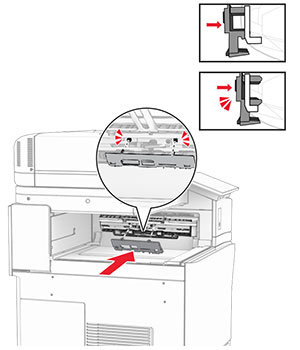 The roller cover is aligned, and then attached to the printer.