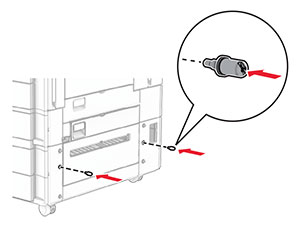 The screws are installed into the lower-right side of the printer.