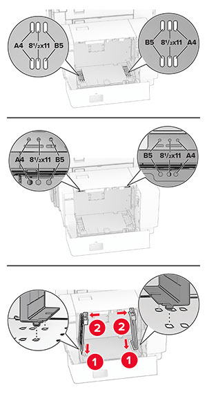 The paper guides are aligned to the size indicators of the tray.
