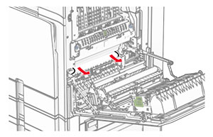Jammed paper below the fuser is removed.