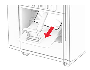 Jammed paper is removed from the finisher booklet bin.