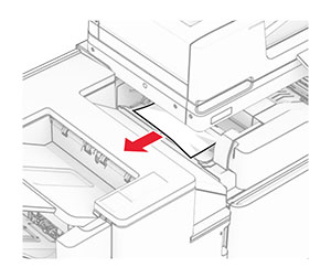 Jammed paper is removed from the paper transport bin.