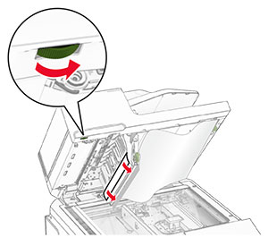 Jammed paper is pulled out.