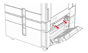 Jammed paper in door E is removed.