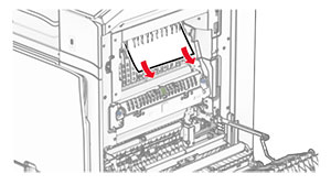 Jammed paper in the standard bin exit roller is removed.