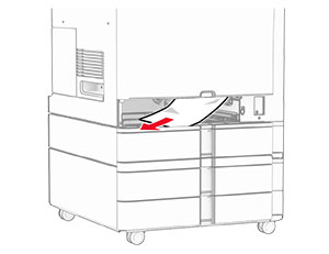 Jammed paper in the standard tray is removed.