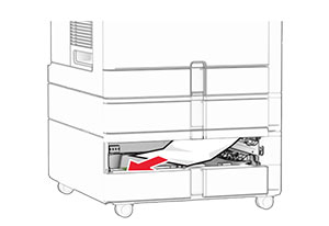 The jammed paper in tray 3 is removed.