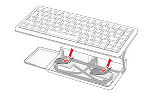 The cover for the adhesives on the keyboard shelf are removed.