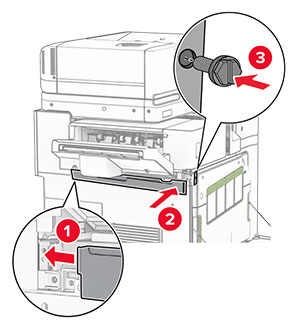 The upper trim cover is inserted to the printer, and then secured with a screw.