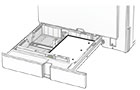 The prepunched paper is loaded faceup with the holes toward the right side of the tray.