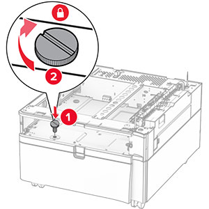 The screws are aligned to the tray base, and then turned clockwise.