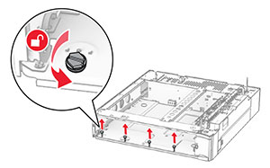 The screws inside the optional 550-sheet tray base are turned counterclockwise, and then removed.