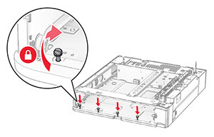 The screws are aligned to the tray base, and then turned clockwise.