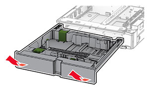 The tray insert is pulled out from the optional 550-sheet tray.