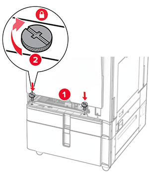 The screws are aligned to the tray base, and then turned clockwise.