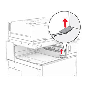 The cover above the front door is removed from the printer.