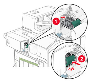 The staple cartridge is inserted into place.