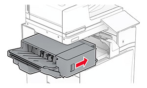 The staple finisher is slid back into place.