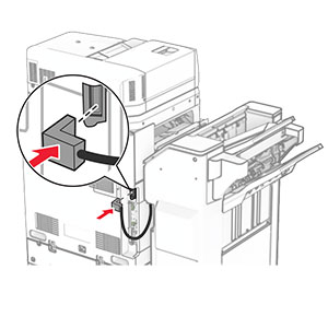 The staple, hole punch finisher cable is being connected to the printer.