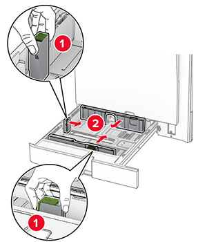 Paper guides are squeezed, and then slid. 