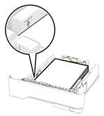 Paper stack is below the maximum fill indicator.