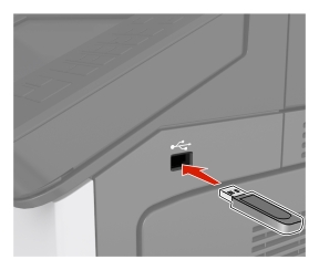 フラッシュメモリがプリンタの USB ポートに挿入されています。