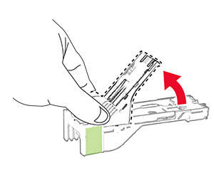 The empty staple refill is pulled out of the staple cartridge. 