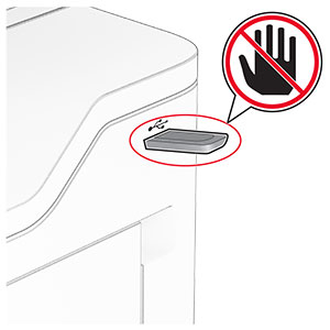 A do not touch icon is placed beside the flash drive that is inserted into the front USB port.