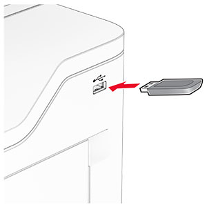 A flash drive is inserted into the front USB port of the printer.