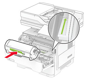 The toner cartridge is inserted into the printer.