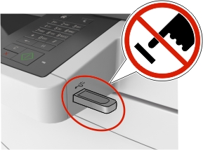 A warning not to touch the memory device that is inserted in the USB port