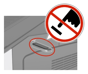 Waarschuwing: Raak de USB niet aan.