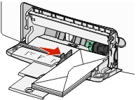 The illustration shows the envelopes being loaded with the flap side up and the return address entering the printer first.