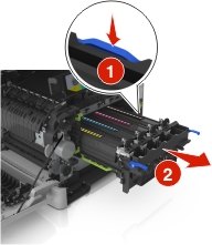 Press down the blue lever, and then grasp the green handles on the sides to pull out the imaging kit.