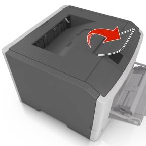 The illustration shows the paper stop being extended.